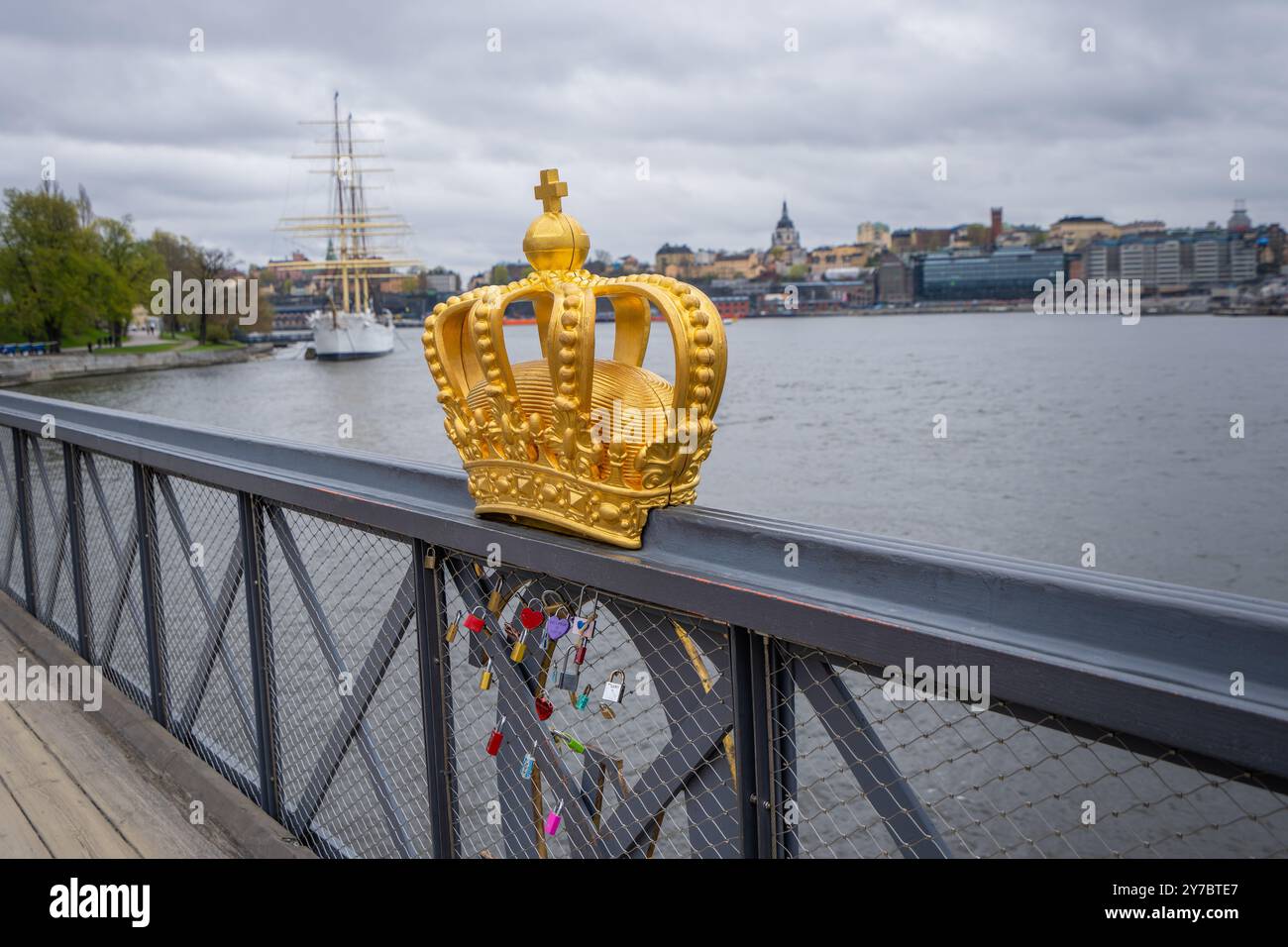 A close-up of the iconic golden crown on Skeppsholmsbron bridge in ...