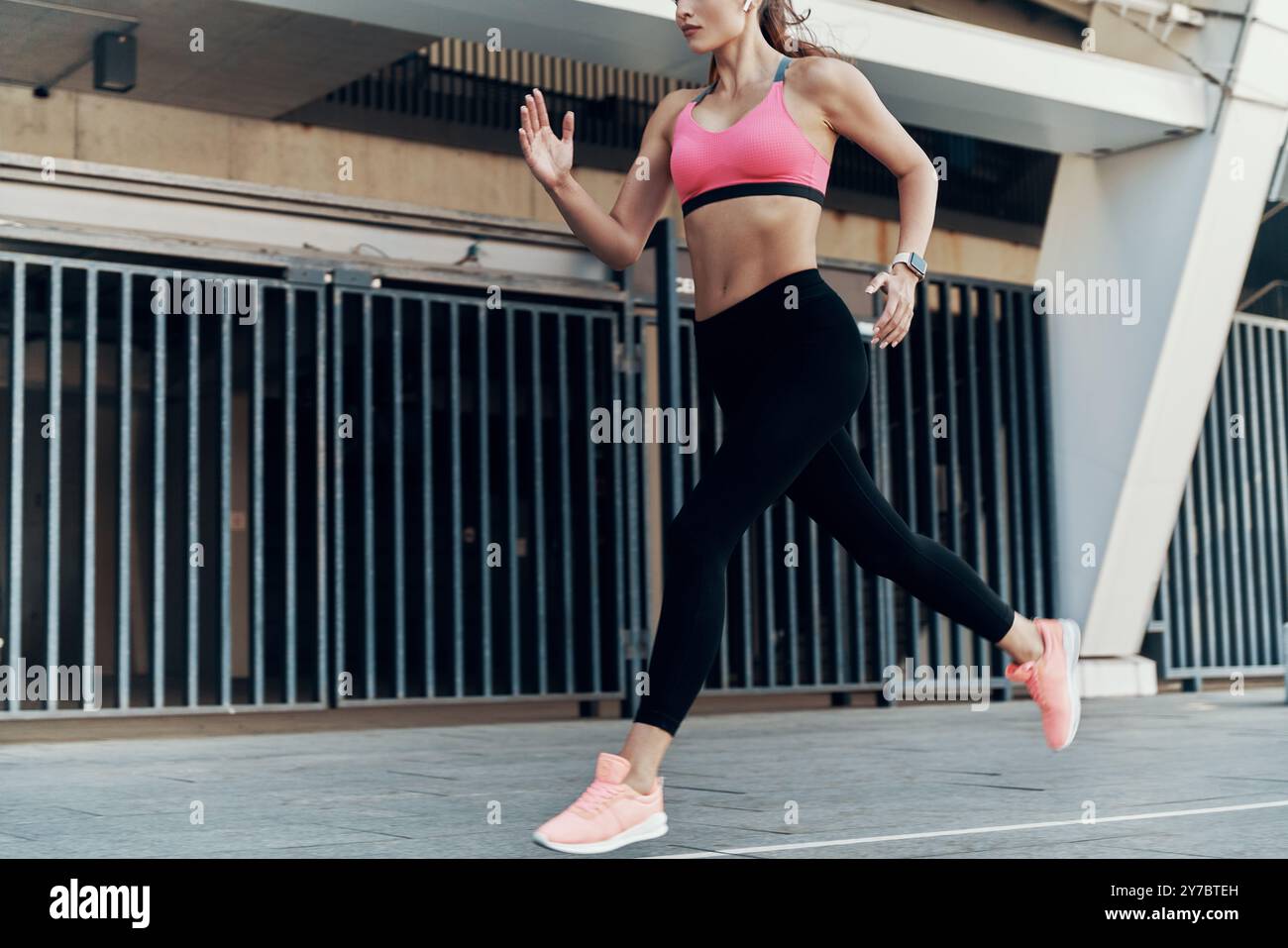 Woman Headphones Smart Watch Running Hi res Stock Photography And woman-headphones-smart-watch-running-hi-res-stock-photography-and