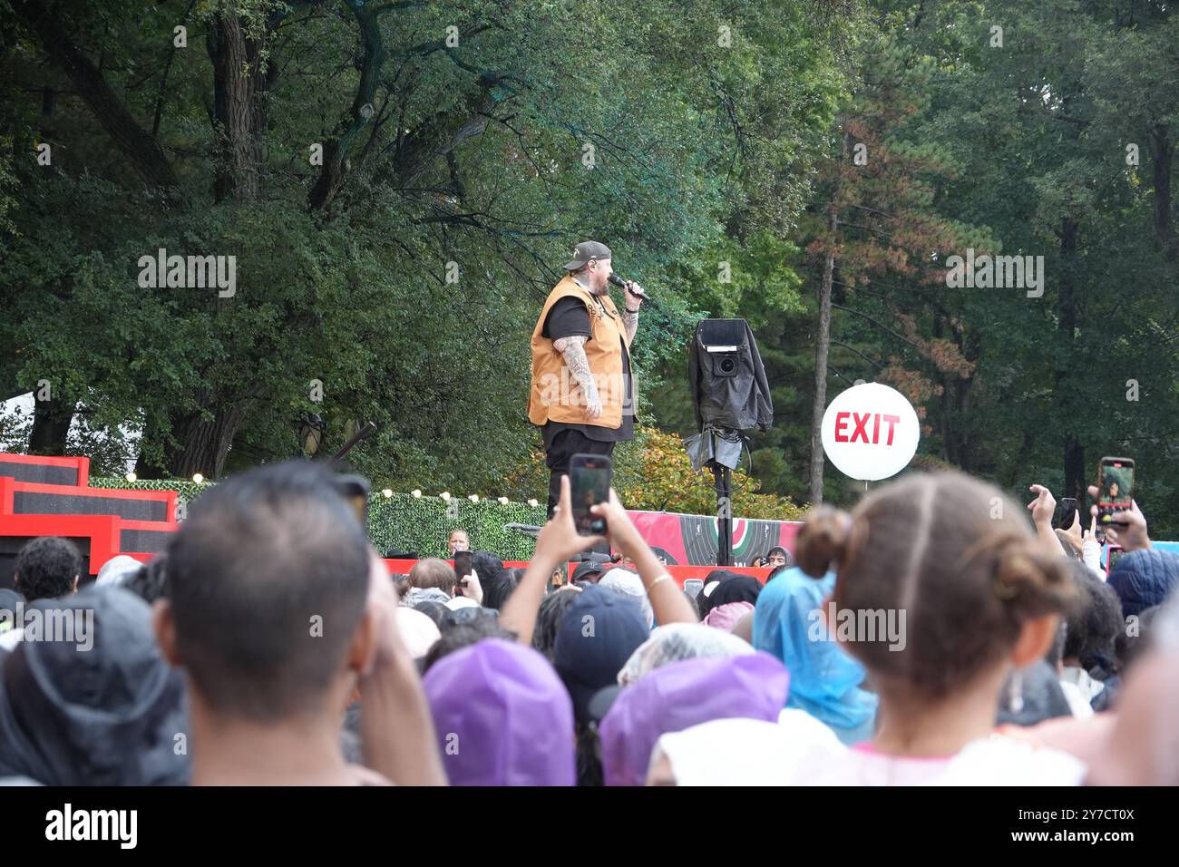 Jelly Roll performing energetically onstage at the Global Citizen