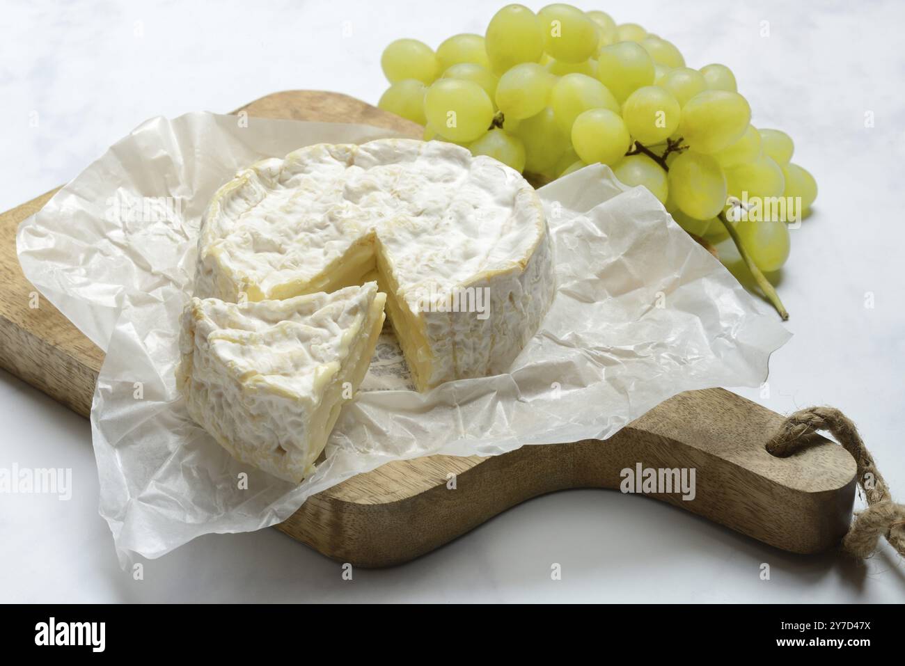 French Camembert, cheese on a wooden board Stock Photo