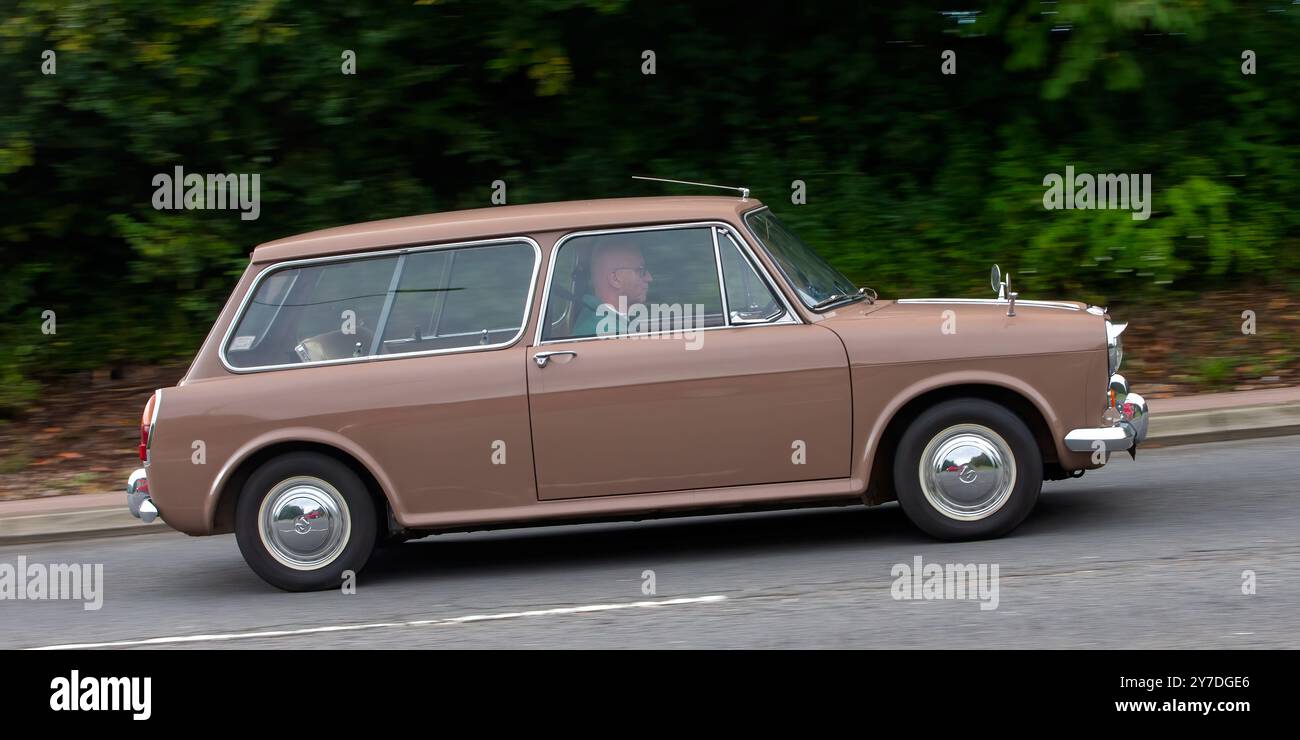 Milton Keynes,UK - Sept 29th 2024:1967 beige Morris 1100 classic   car driving on a British road Stock Photo