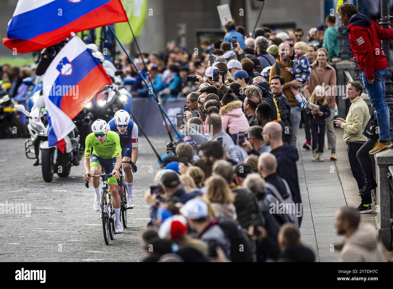 Gold medalist Slovenia's Tadej Pogacar, front, competes during the Men