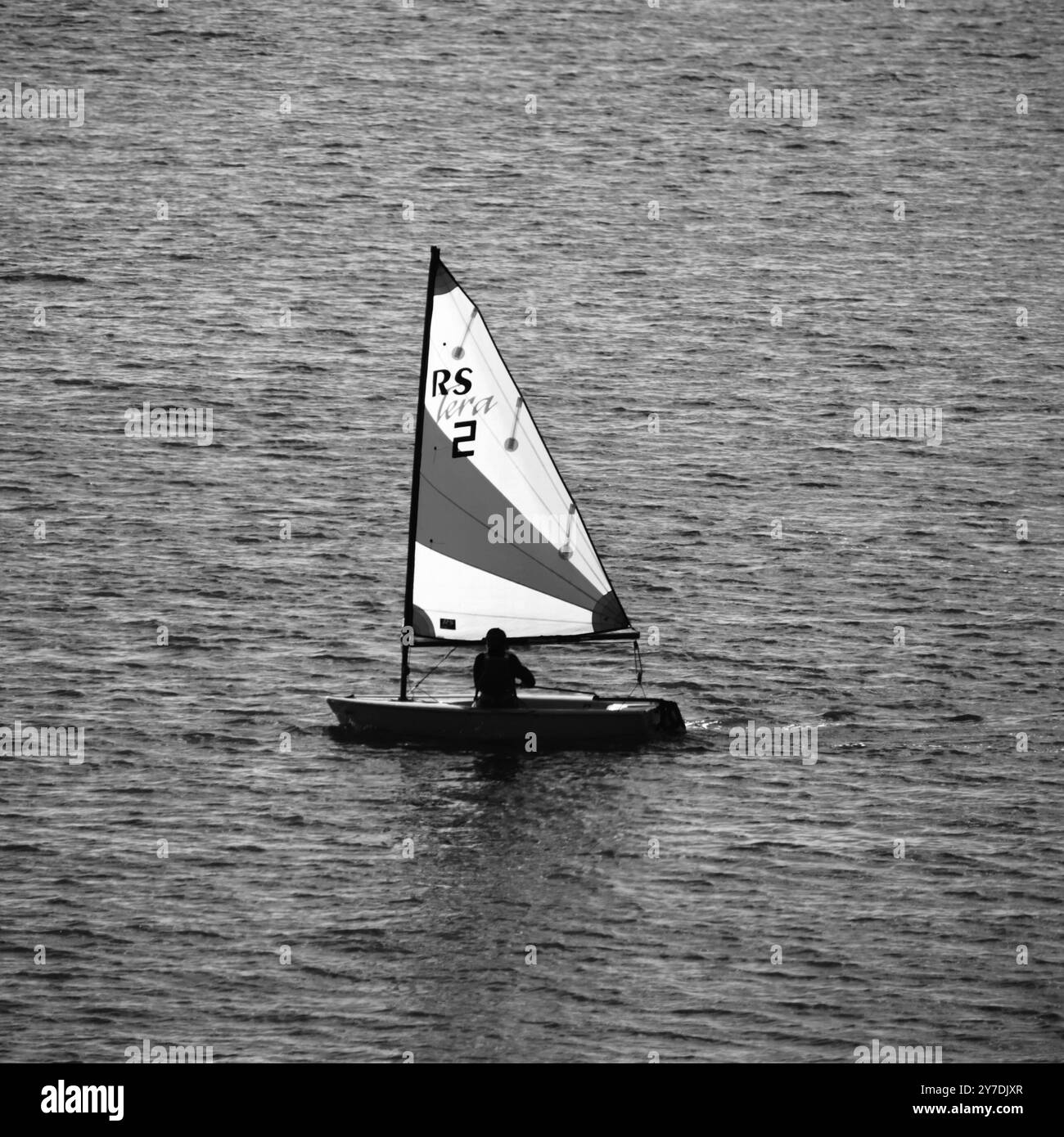 sunlit sailing Solcombe Cornwall Stock Photo