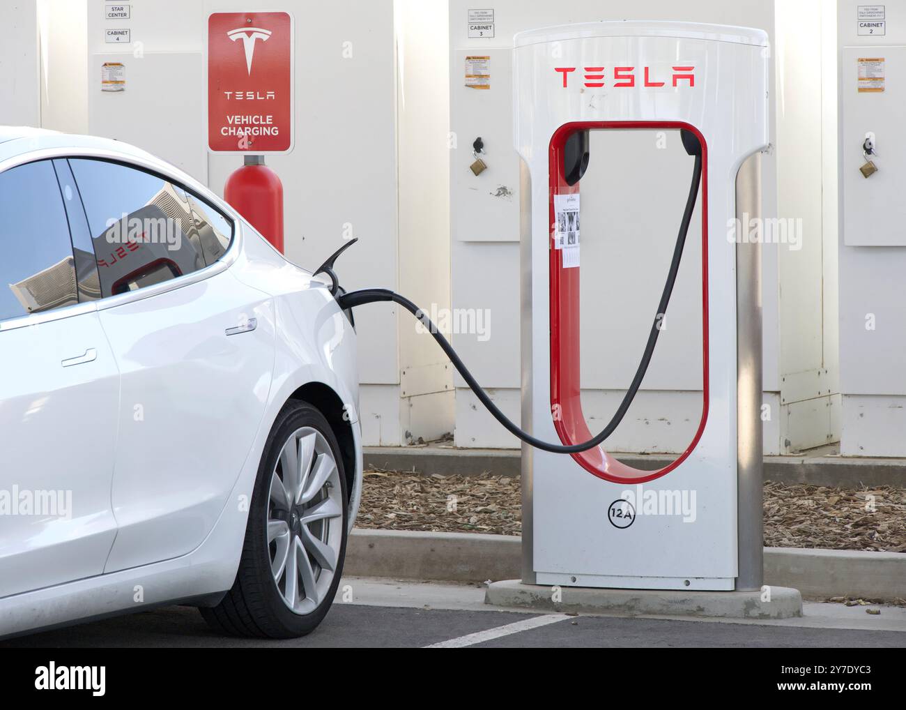 Coalinga, CA - May 29, 2024: Car charging at a Tesla Supercharging ...