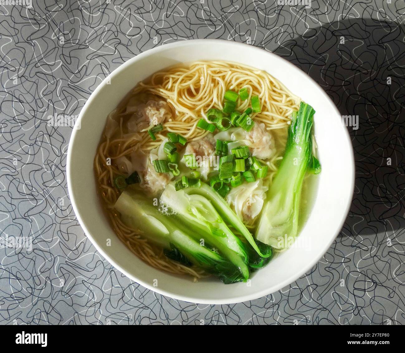 Wonton noodle soup at a Chinese restaurant Stock Photo