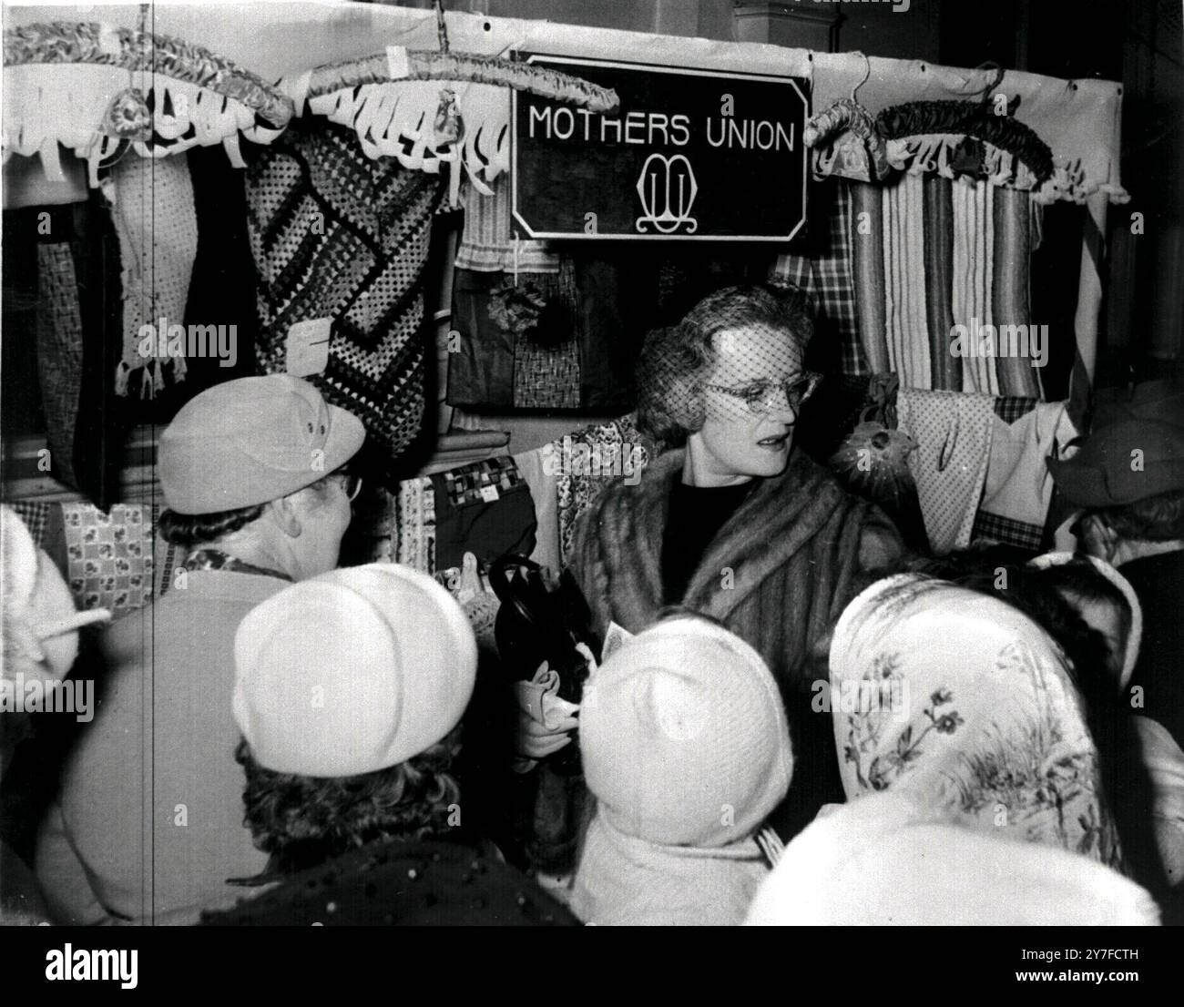 Mothers Union stall at St Matthews Church bazaar, Luton - The Duchess of Bedford who opened the bazaar is seen buying - 6th December 1959 Stock Photo