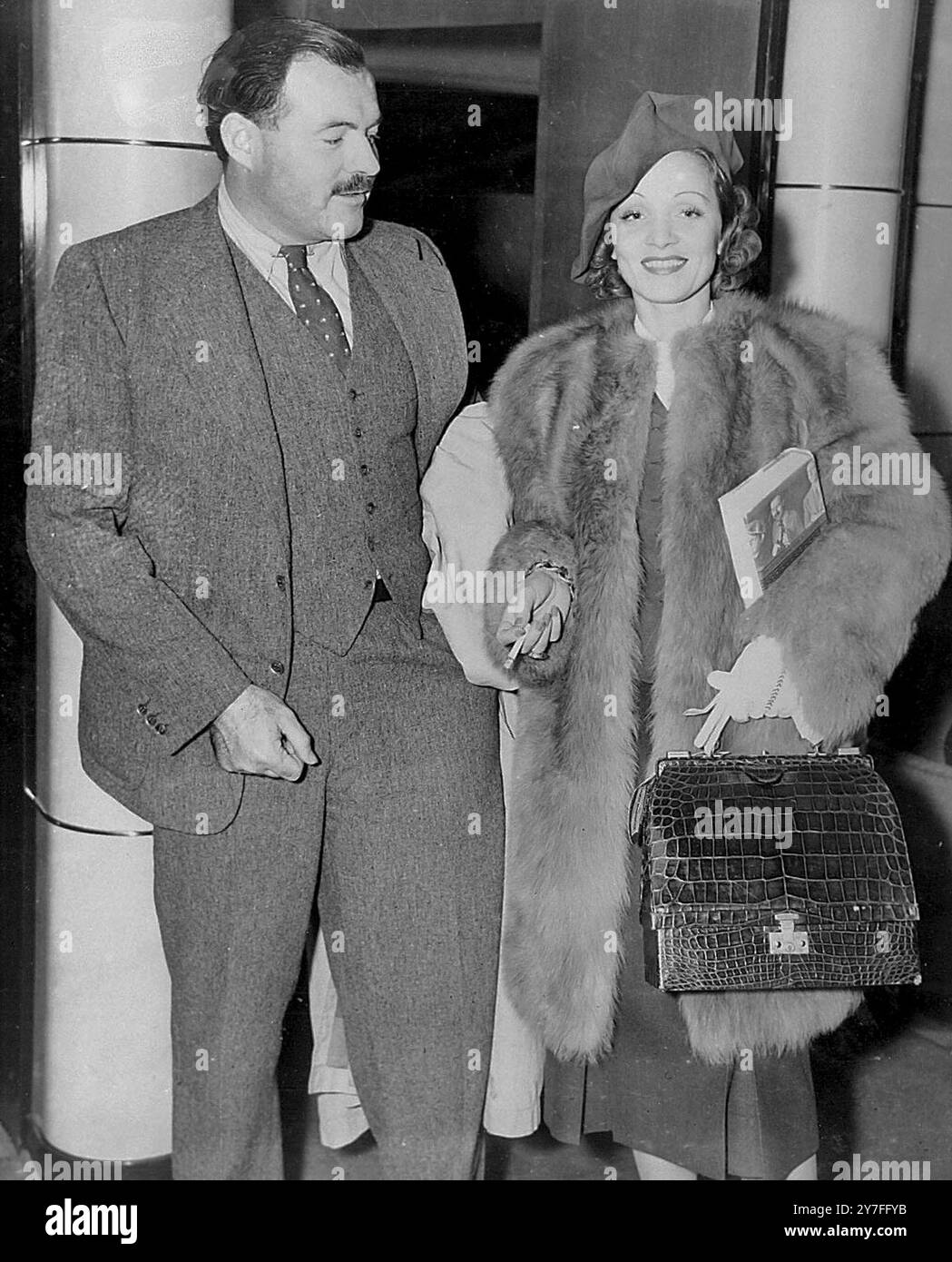 Ernest Hemingway shown with actress Marlene Dietrich. November 1938 ...