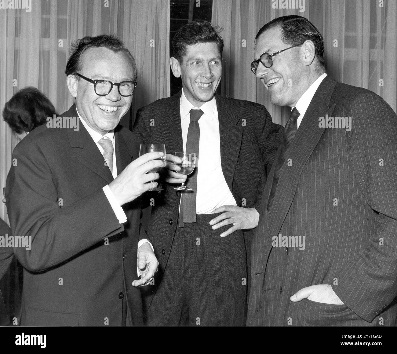 Mr. Reginald Maudling (right), President of the Board of Trade and Industry talking to associate architects, Finn Juhl (left) and Trevor Dannatt. Showrooms of Danish furniture manufacturers, C.W.F. France and Son - 18 New Bond St. London -   20th October 1960 Stock Photo