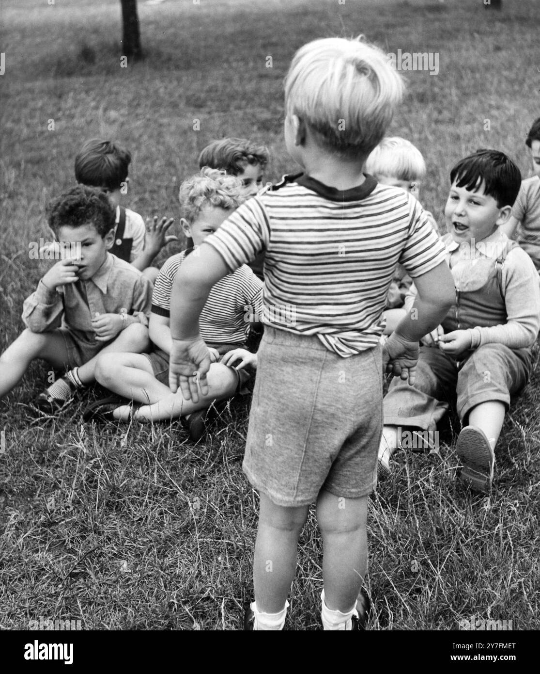 Children playing in Hyde Park, London. They were guests at The Panda ...