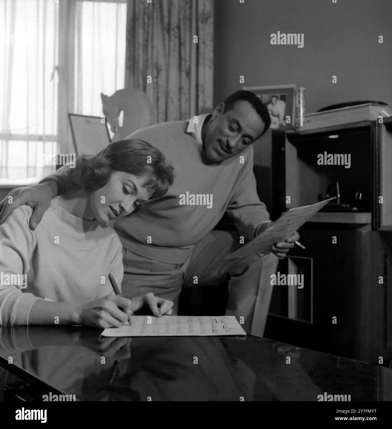 Ray Ellington, 1915-1985, at home in London with wife Anita West who was the second female presenter of Blue Peter   After 1958 Stock Photo