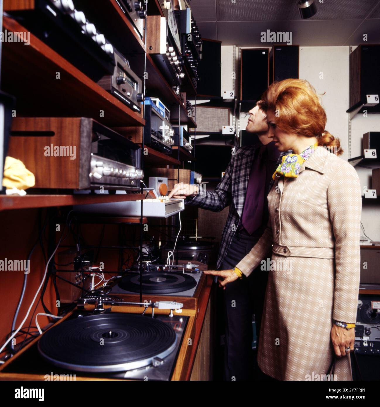 Buying hi-fi equipment in the 1970s Stock Photo