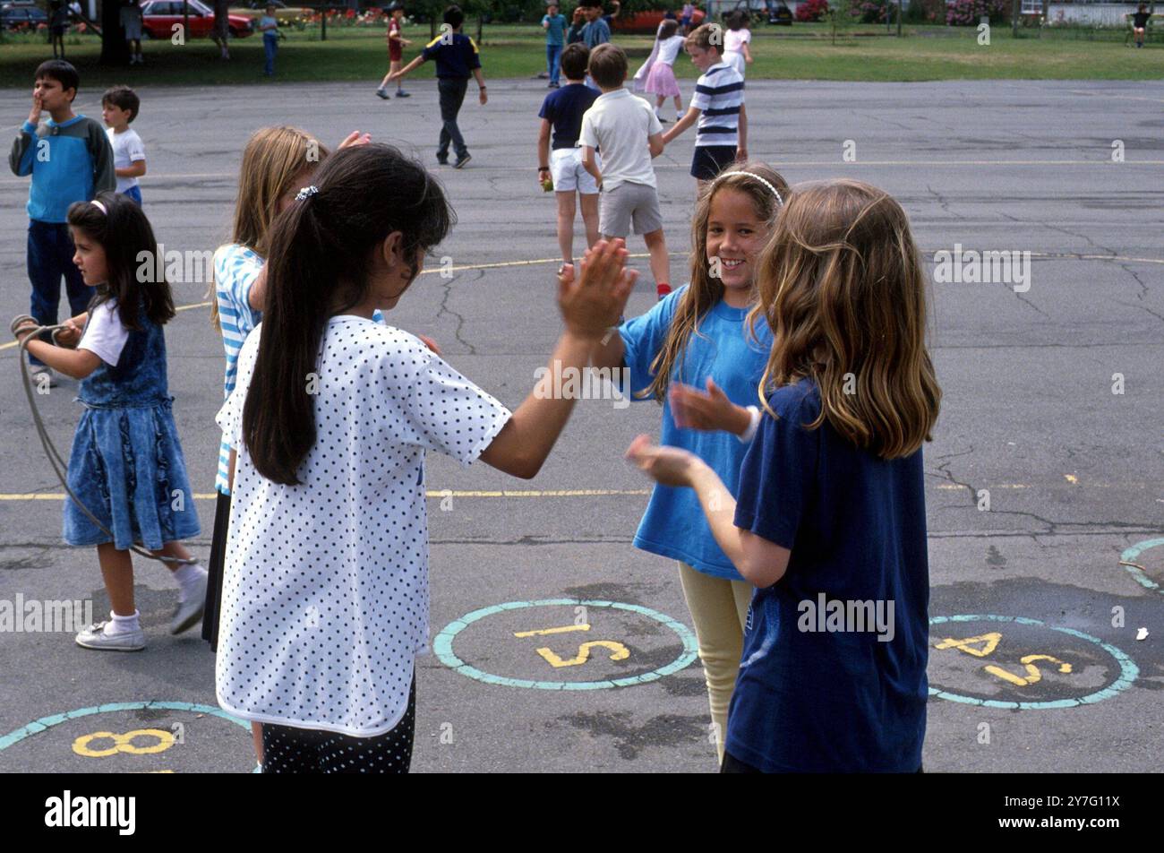 Primary school, games in the playground Stock Photo - Alamy
