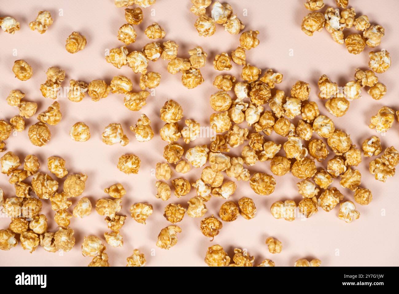 Sweet caramelized popcorn top view close up. Stock Photo