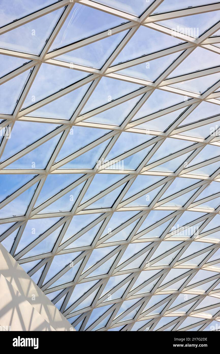 Lightning Layout Mall Glass roof of the mall inside view with part of white concrete wall and ...