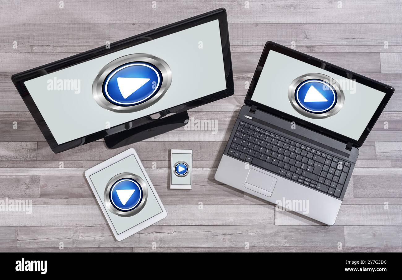 Play concept shown on different information technology devices Stock Photo