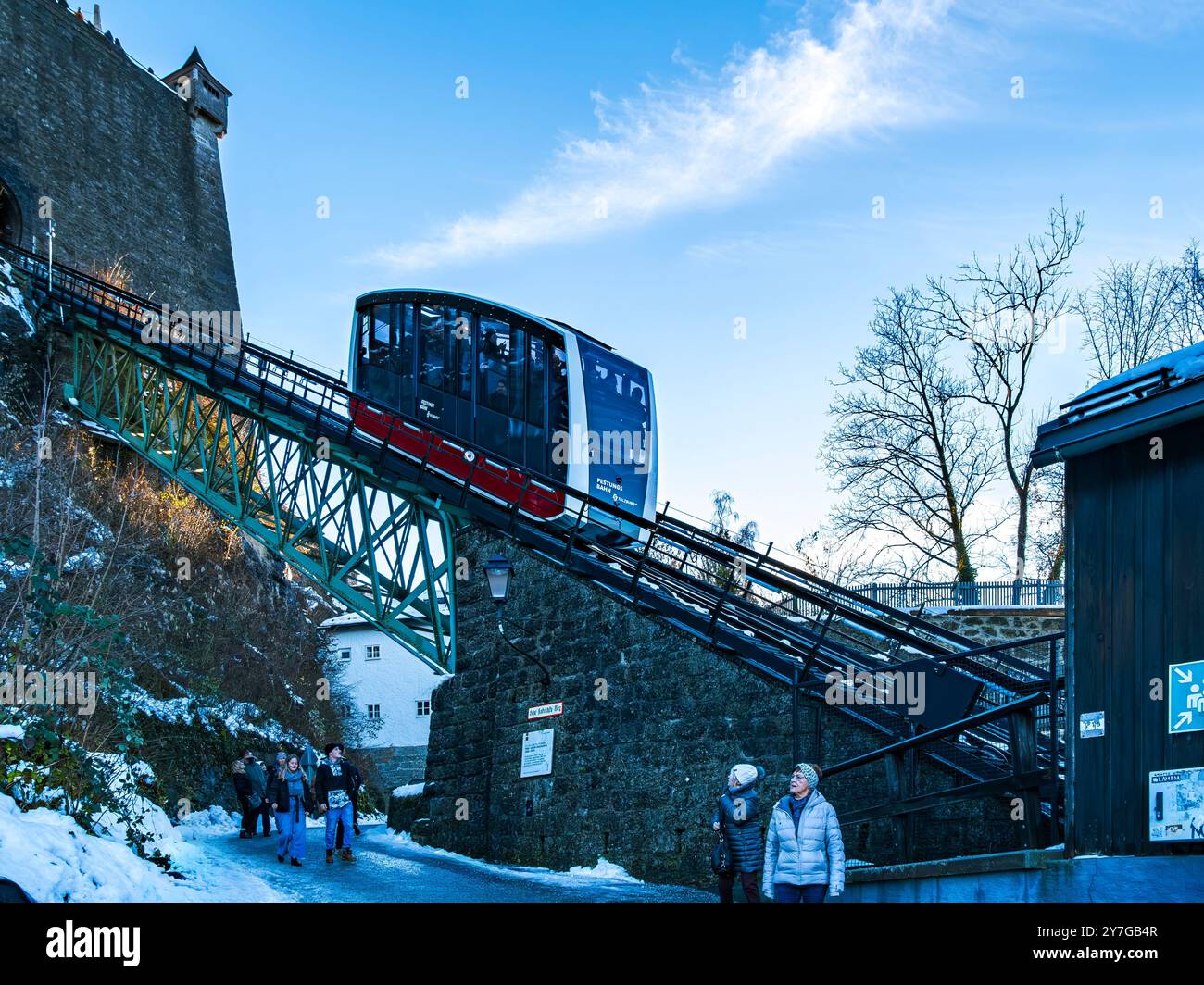 Tourist-packed Fortress Railway ride between the Old Town and Hohensalzburg Fortress, Salzburg, Austria, for editorial use only. Stock Photo