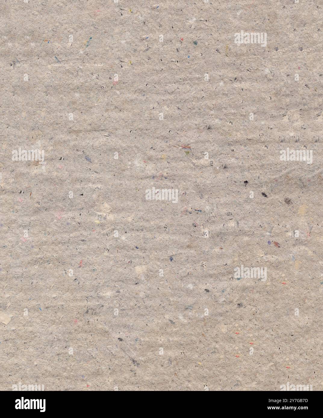 Pressed uneven dense gray cardboard with debris particles Stock Photo