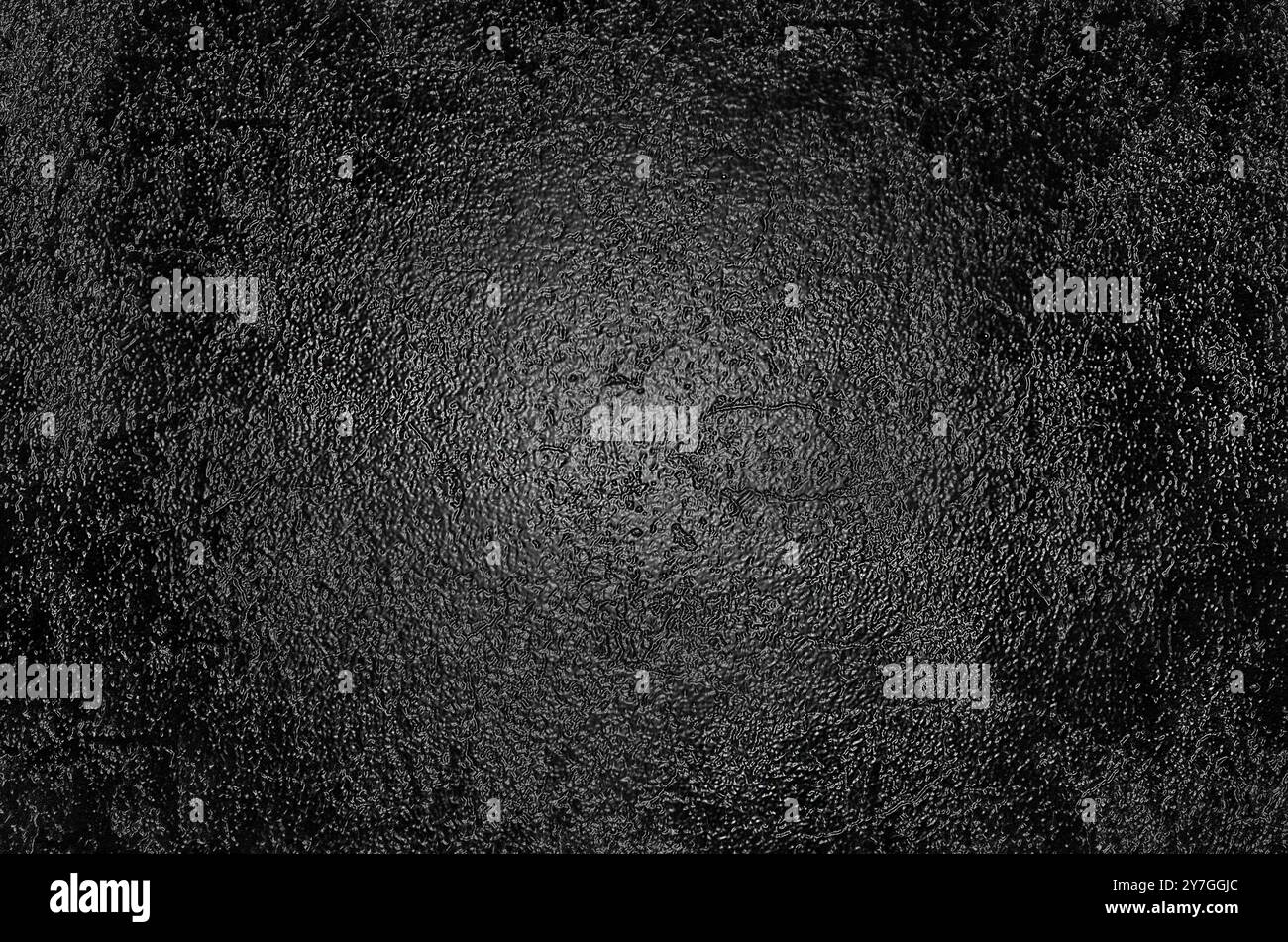 Rough embossed glossy black surface Stock Photo