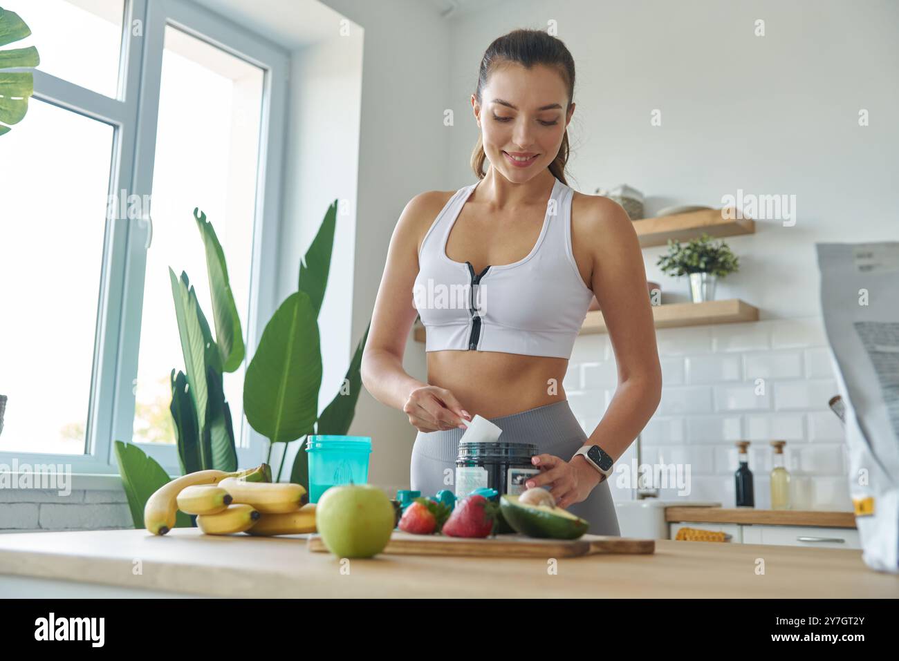 Young athlete eating fruit at sport hi-res stock photography and images ...