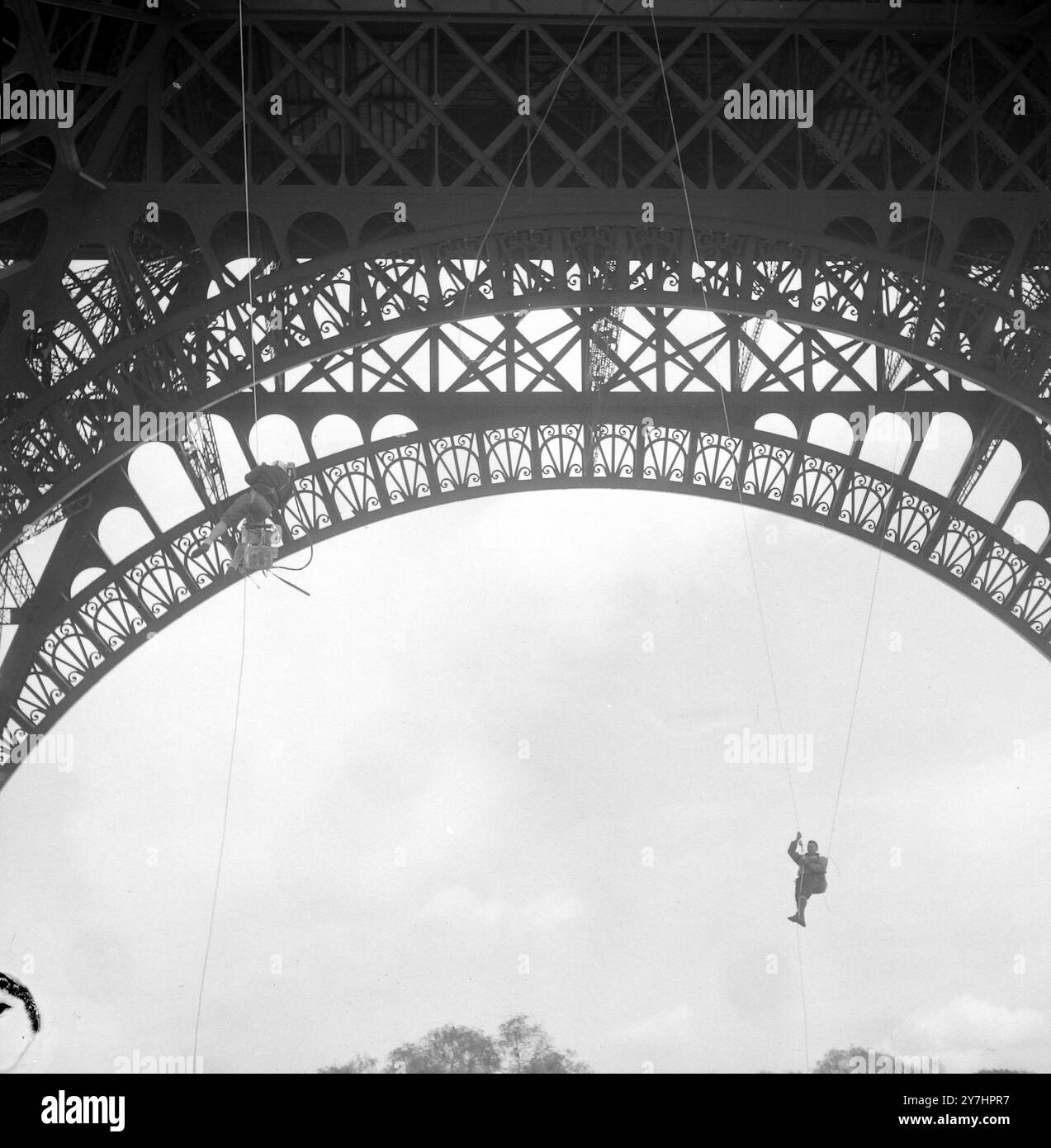 alpinists-climbing-eiffel-tower-in-paris-4-may-1964-stock-photo-alamy