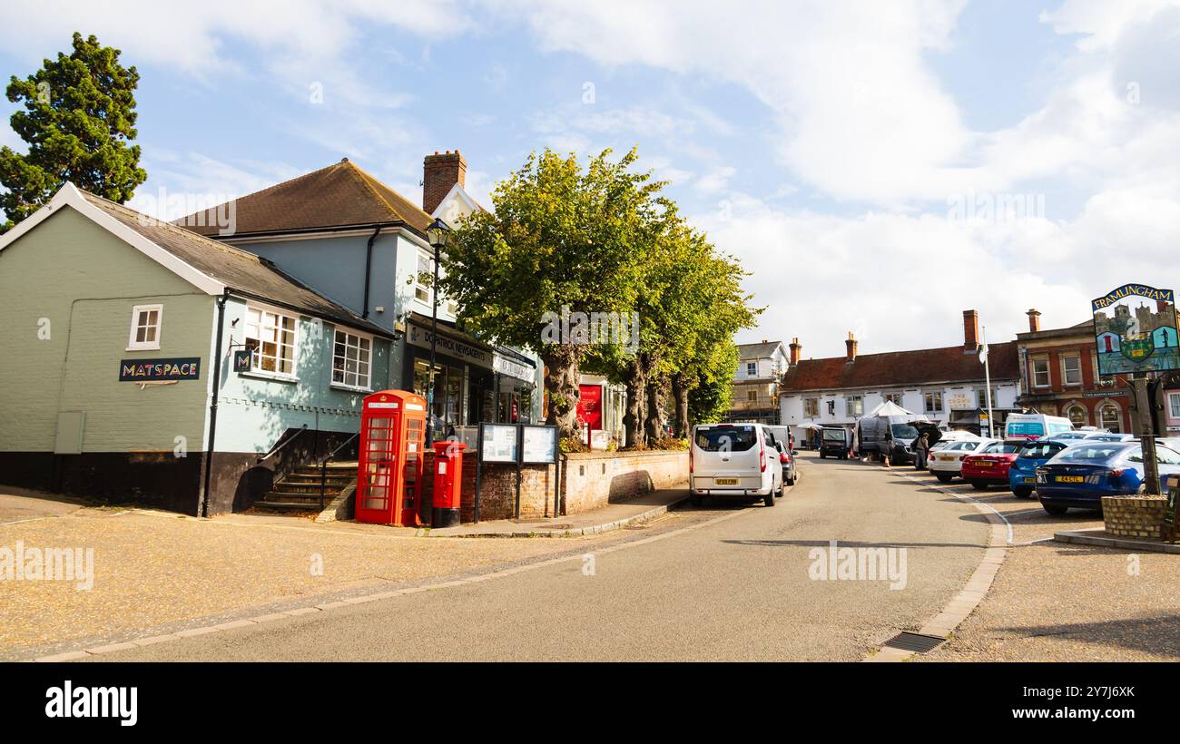 Market place street view, with parked cars and people, Framlingham market town, Suffolk, England Stock Photo