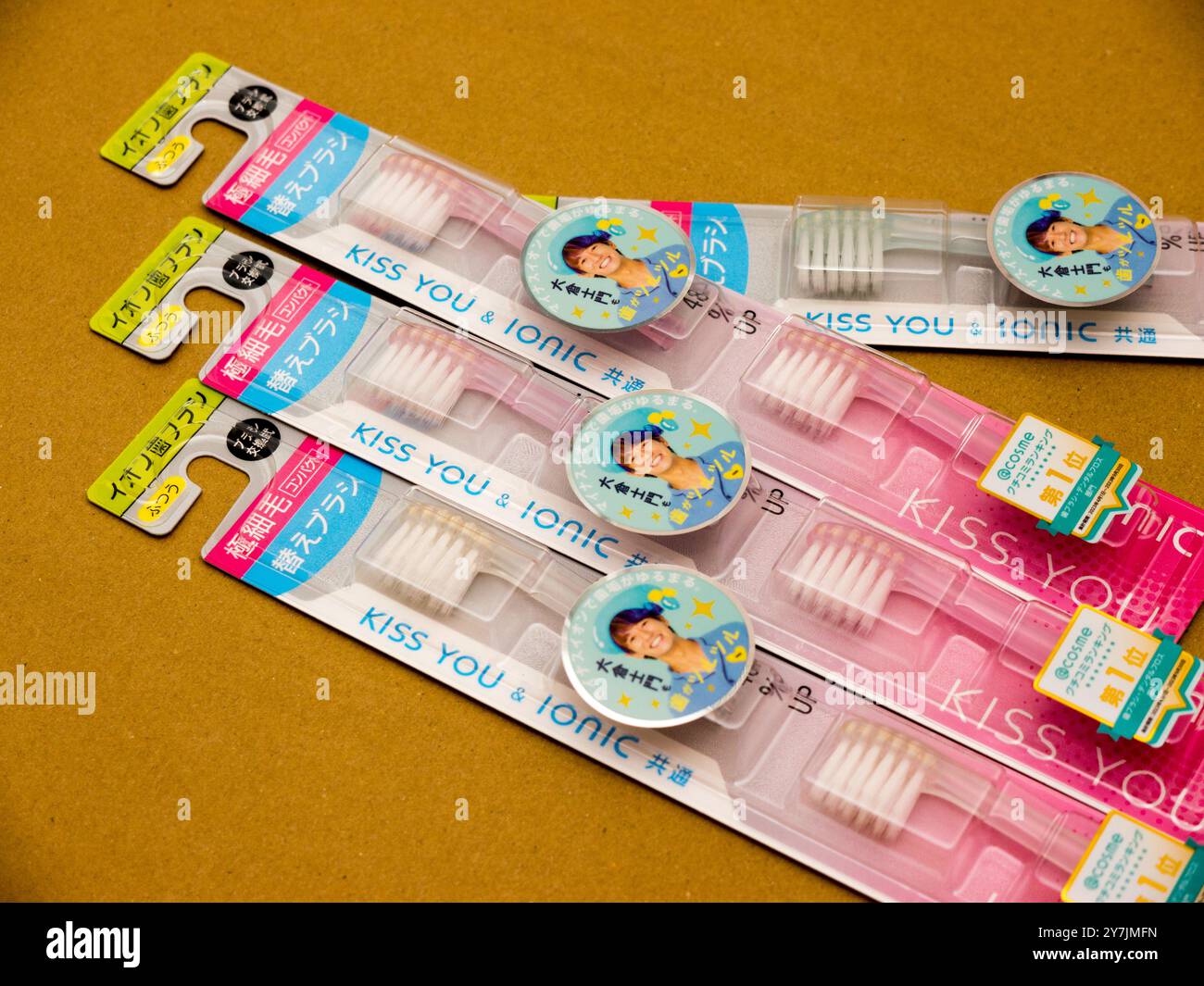 Japan Cosme Kiss you ionic Toothbrush. Cosme Inc. manufactures and sells OTC pharmaceuticals, oral hygiene products, deodorizing air fresheners. Stock Photo