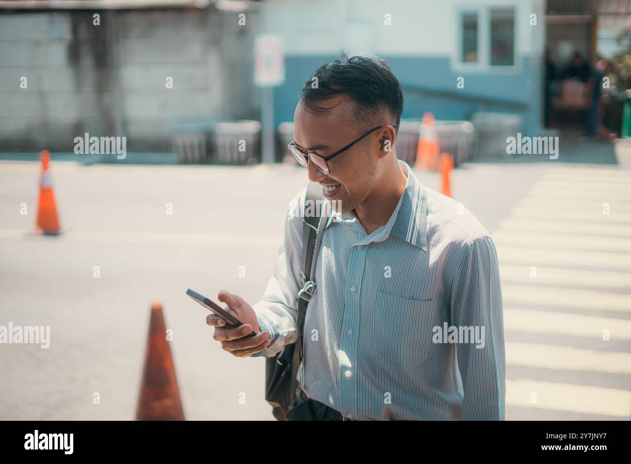 Man in headphones walks hi-res stock photography and images - Alamy