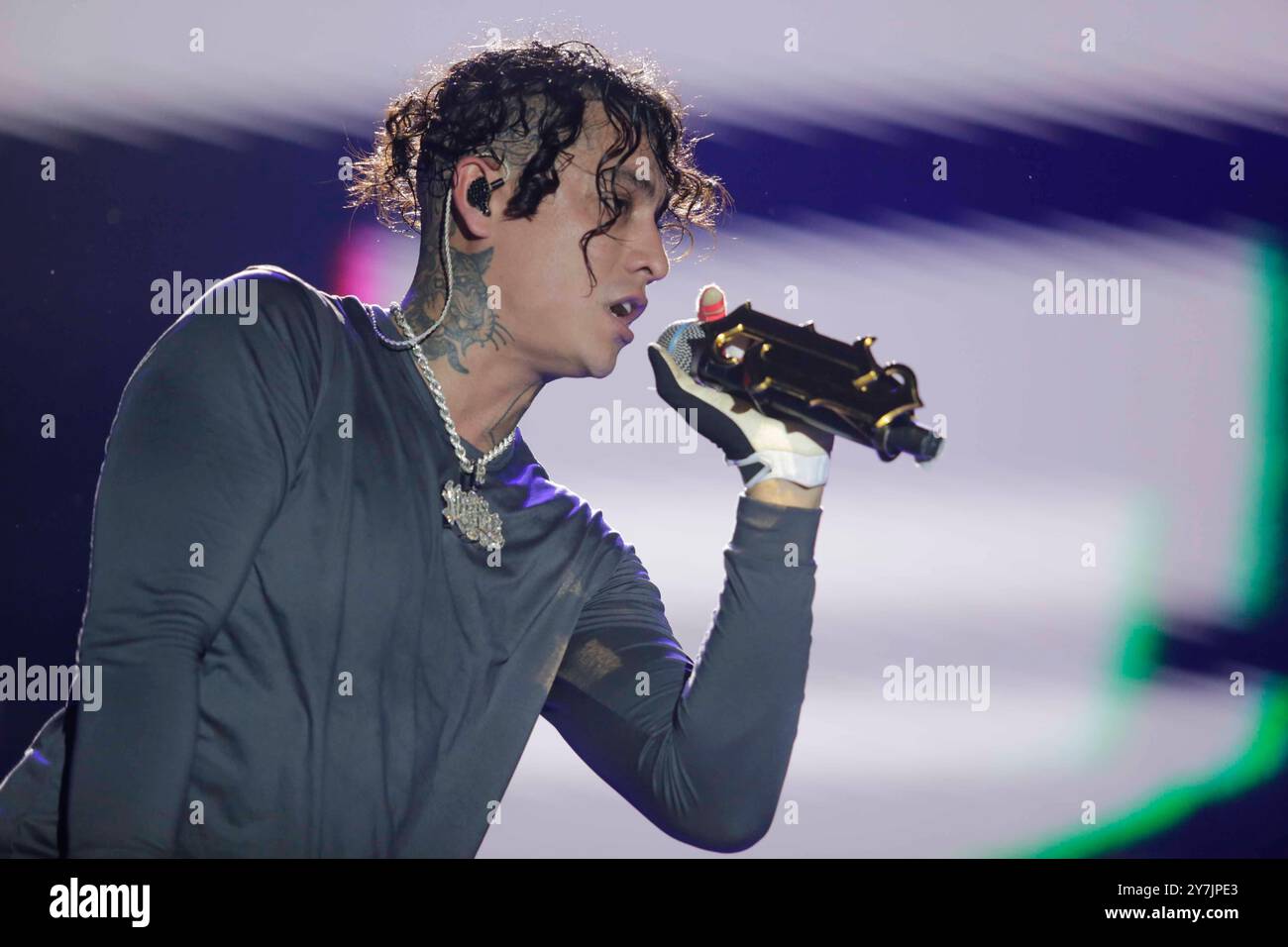 ALEMAN, a Mexican rapper and composer, performed at a free event at the ...