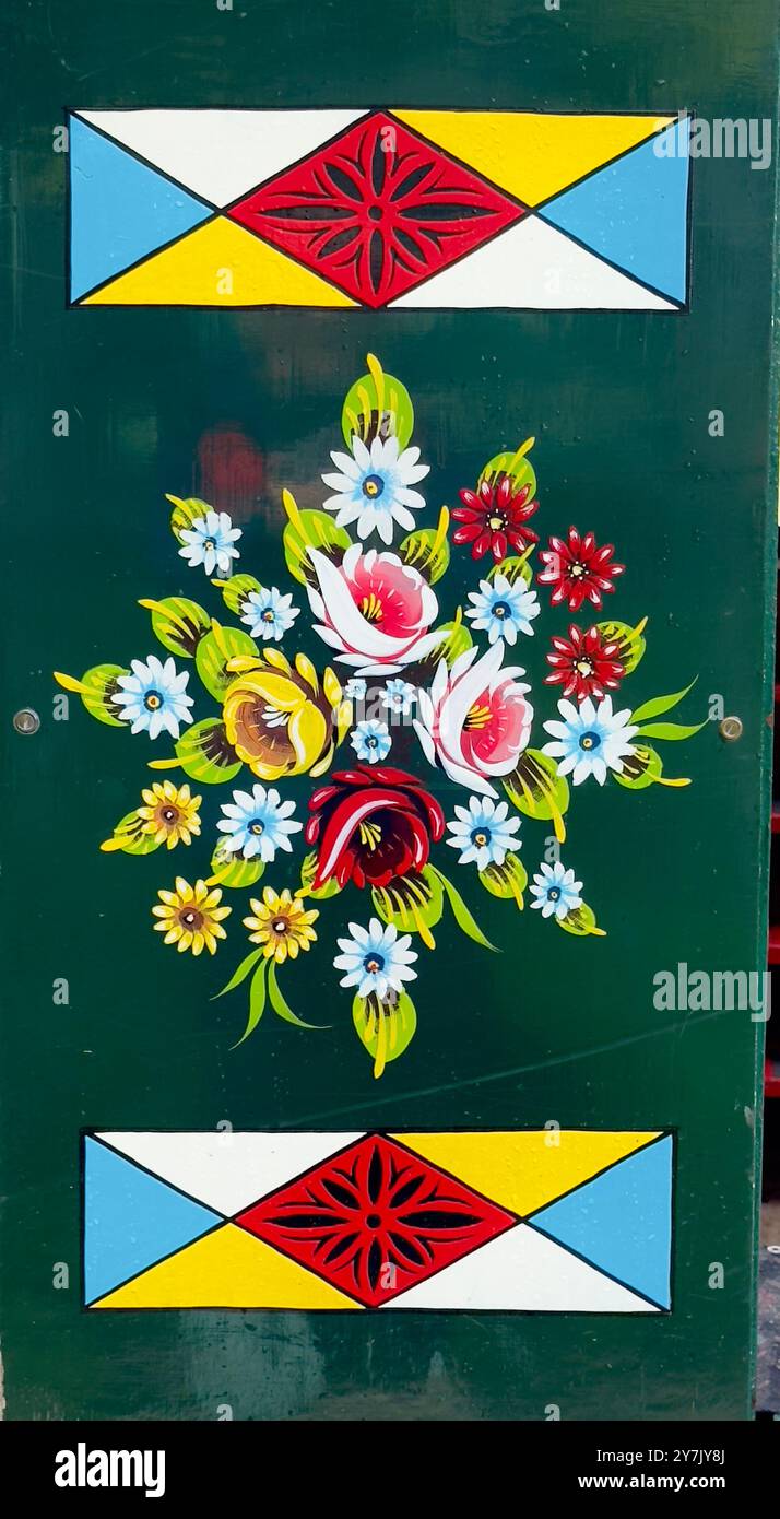 Traditional canal boat painting on the doors of a narrow boat. - Smartphone Captured Stock Image