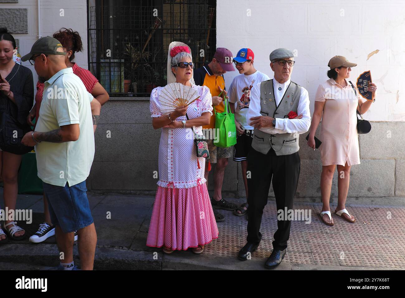 People in typical costumes at La Paloma feasts in Madrid. Stock Photo
