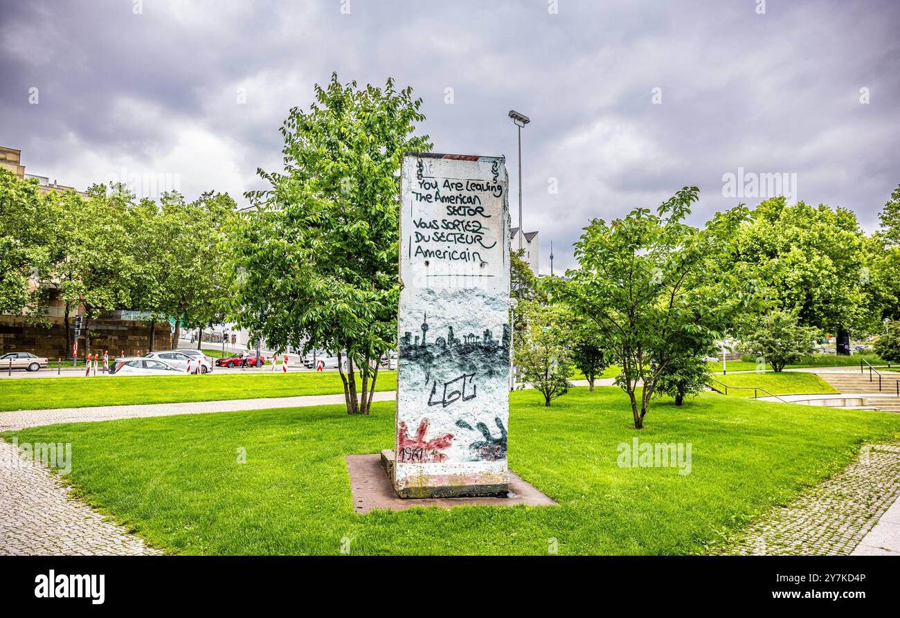 Stuttgart, Germany, 3th Jun 2024: A piece of the Berlin Wall stands in front of the state parliament in Stuttgart. It not only serves as a sight, but Stock Photo