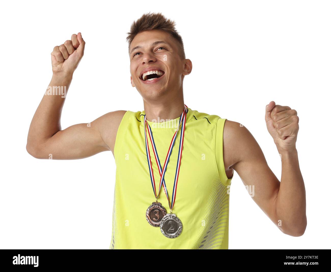 Happy winner with different medals on white background Stock Photo - Alamy