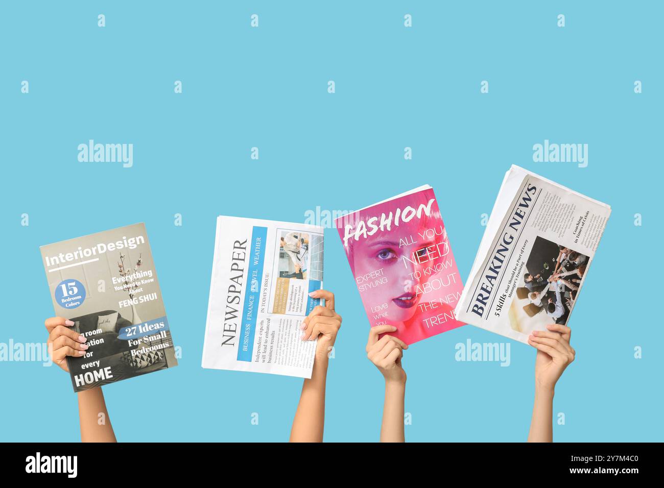 Female hands with different magazines and newspapers on blue background Stock Photo
