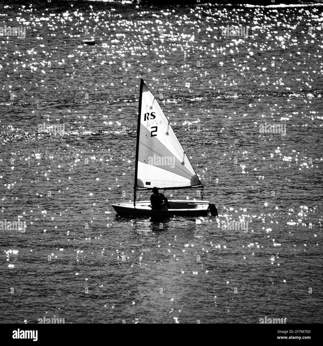 sunlit sailing Solcombe Cornwall Stock Photo