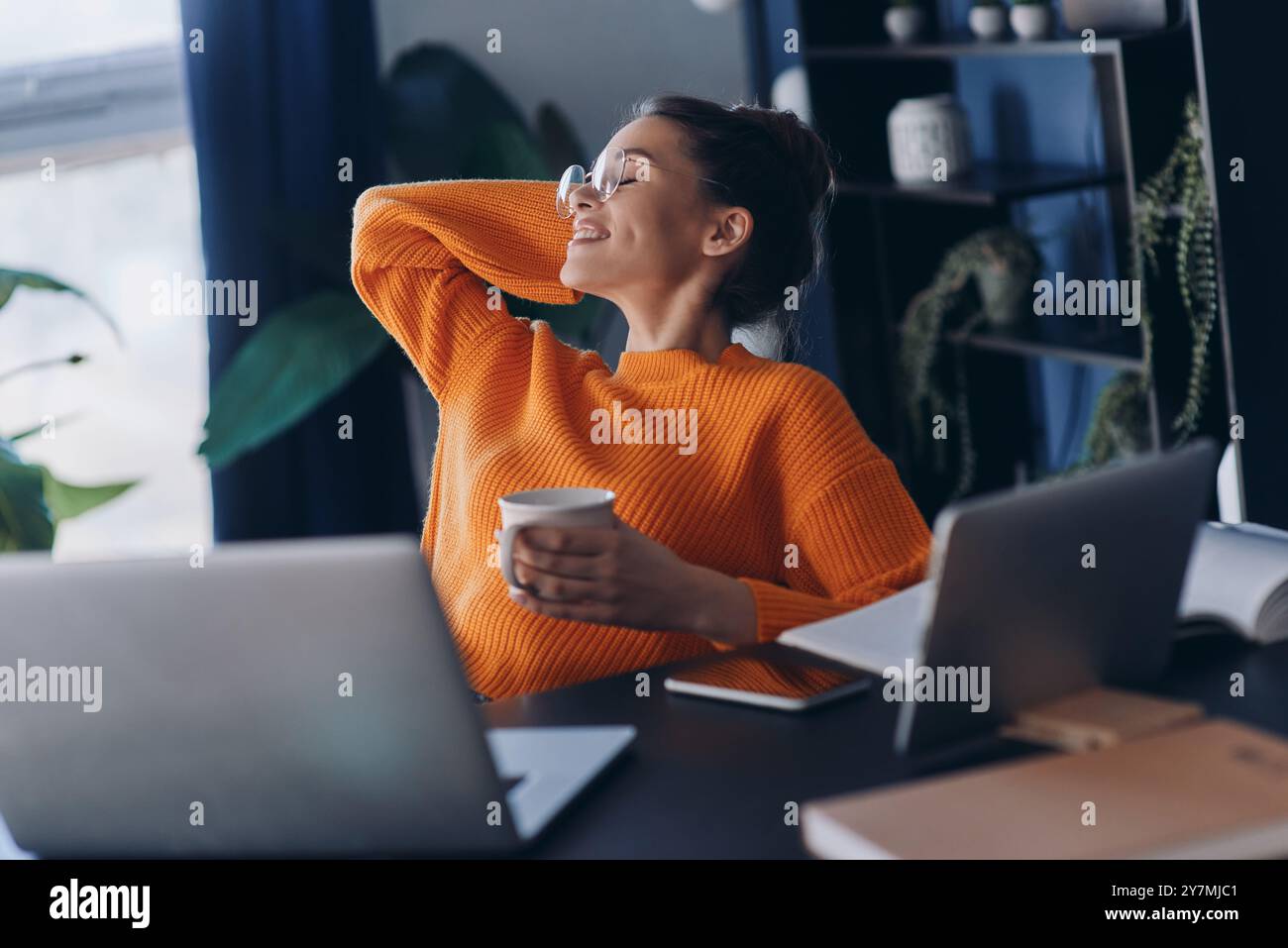 Business woman resting feet on hi-res stock photography and images - Alamy