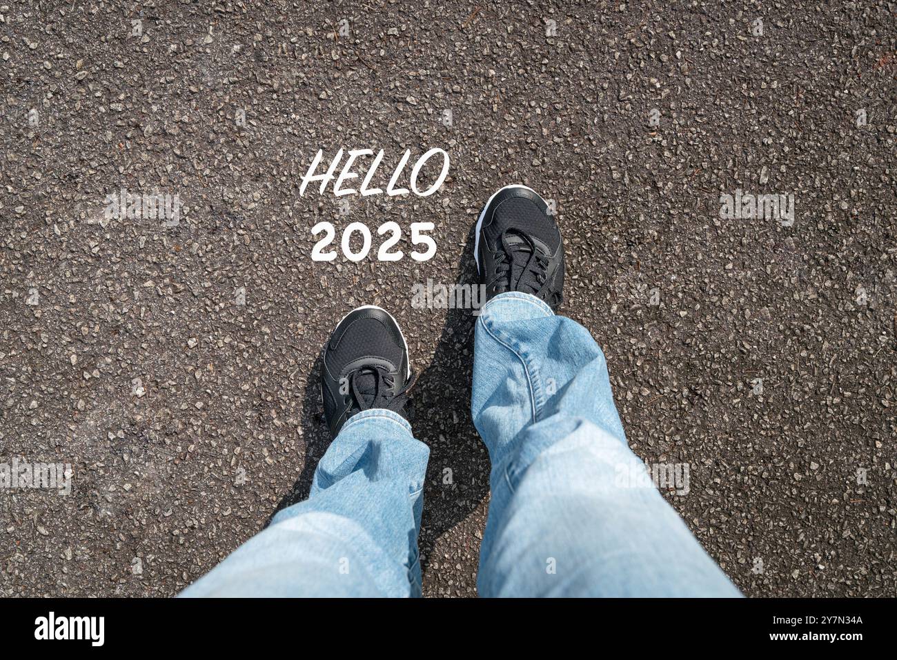 hello-2025-with-women-wearing-sports-shoes-with-jeans-top-view-new