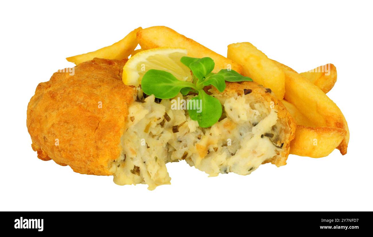 Battered fish and potato fish cake with lemon and lambs leaf lettuce garnish Stock Photo