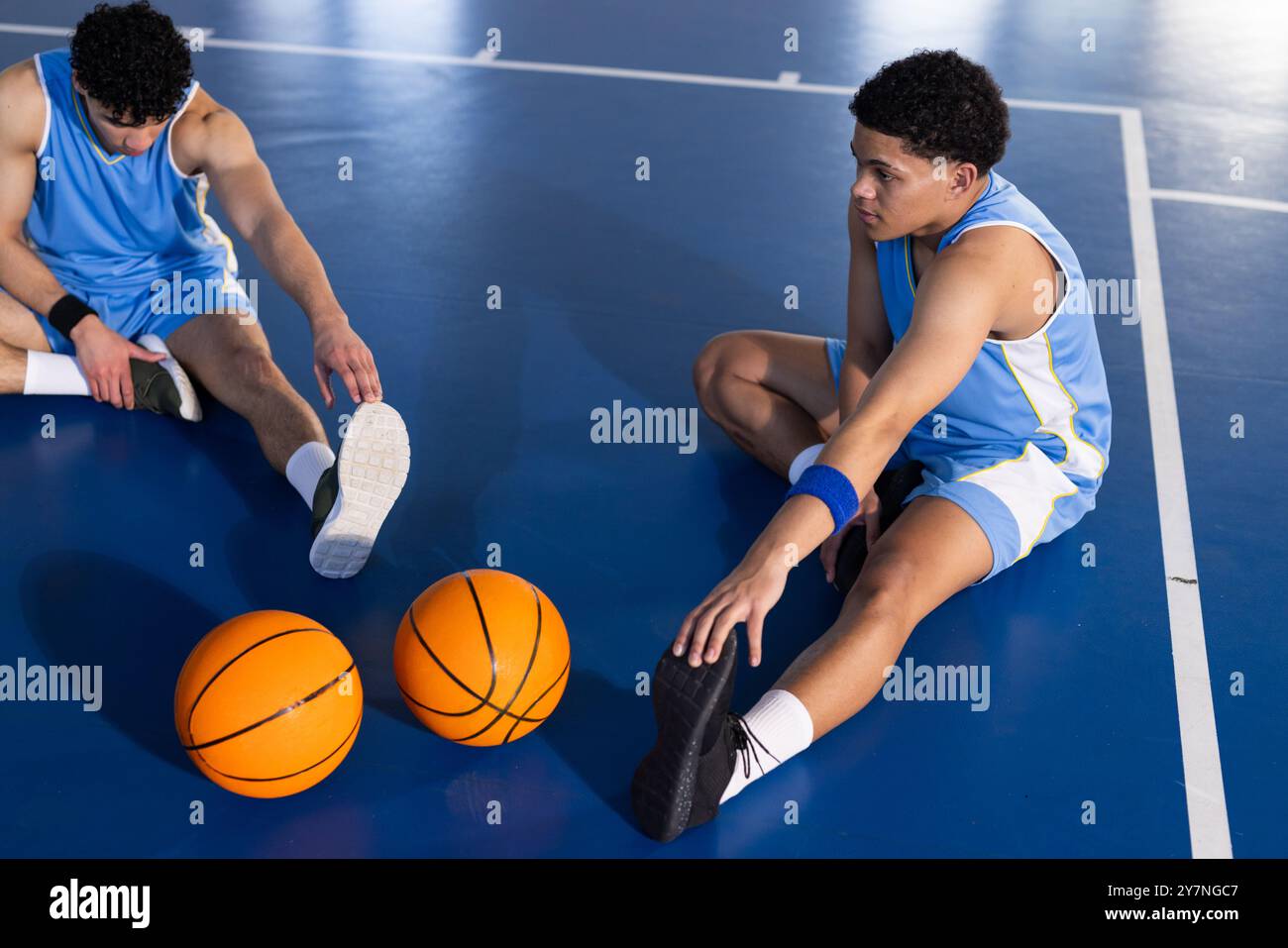 Two athletes stretching preparing hi-res stock photography and images ...