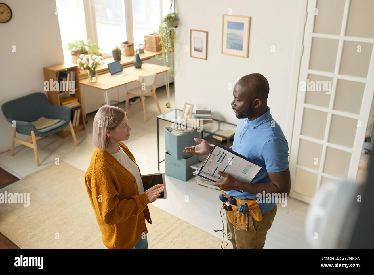 Bearded Black Man Working in Home Repairs Stock Photo