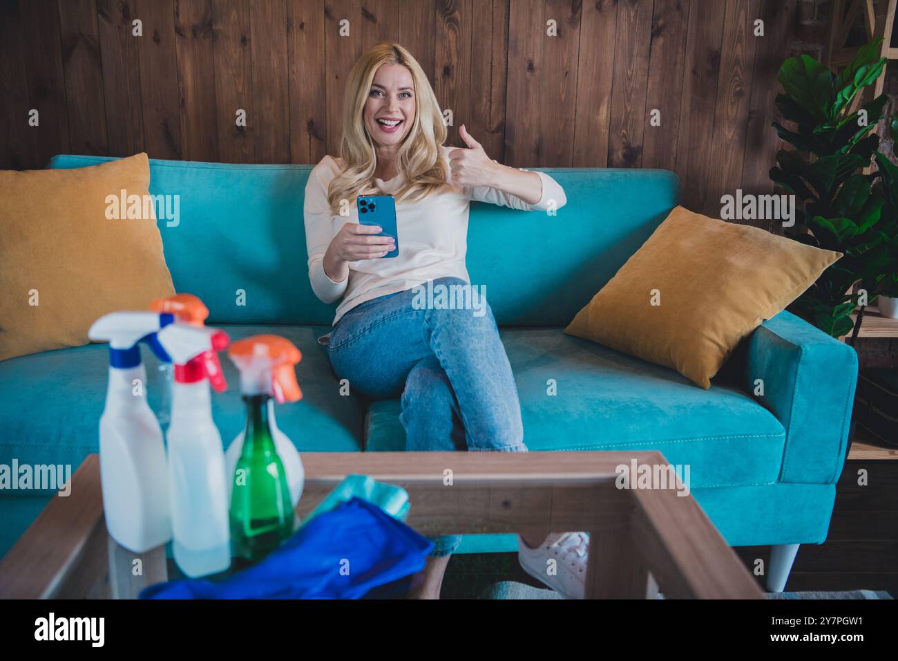 Photo of adorable sweet lady wear white shirt doing daily cleaning ...