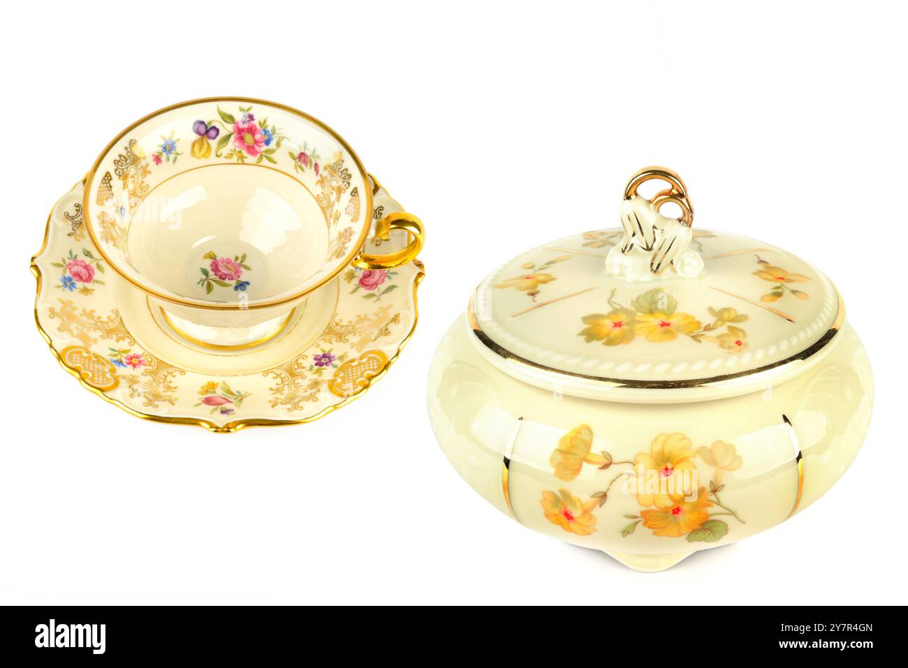 Vintage porcelain tableware: coffee cup with saucer and elegant candy bowl isolated on white background. Collage. Stock Photo