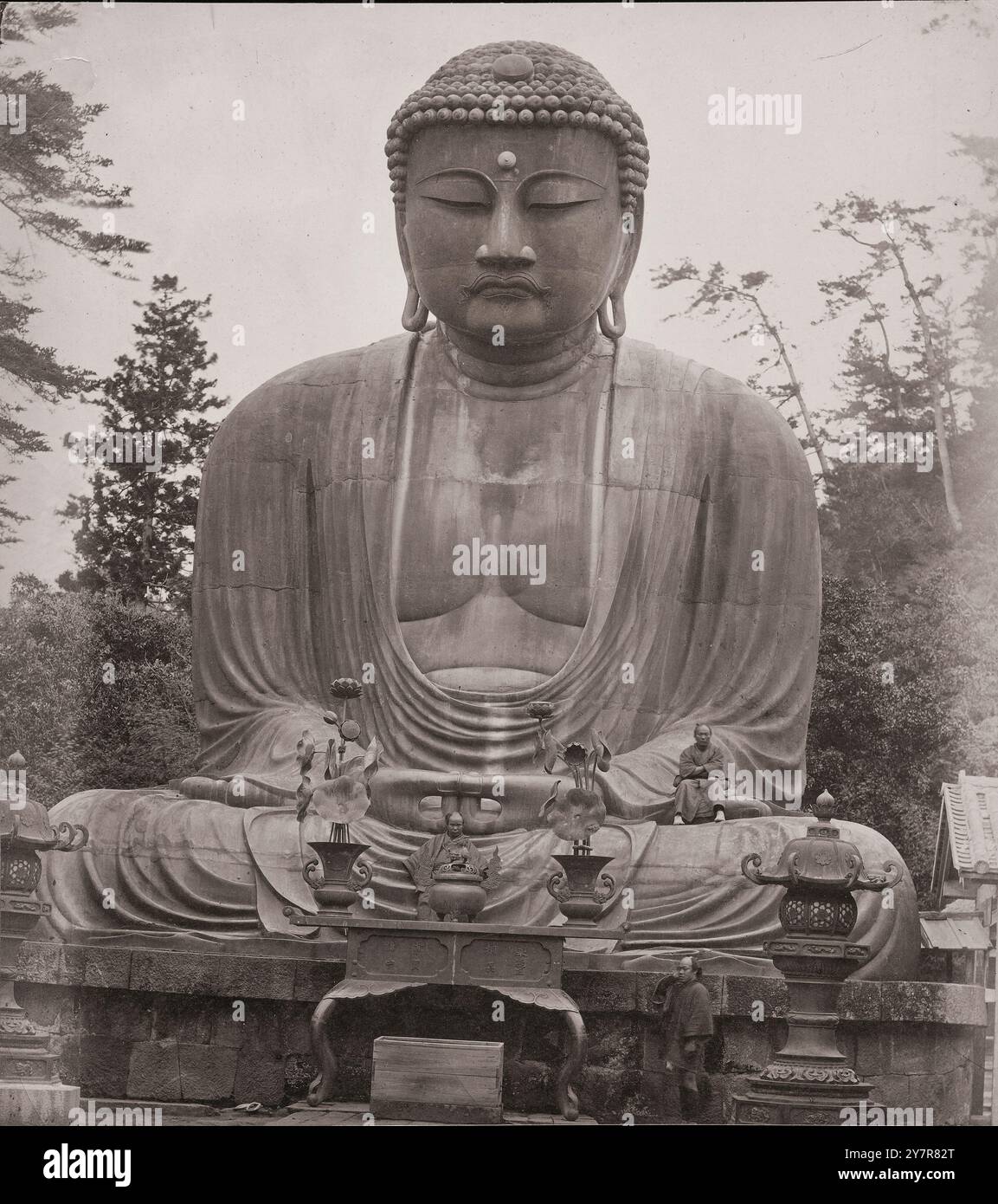 The Great Buddha of Kamakura (Daibutsu) with stone lantern in