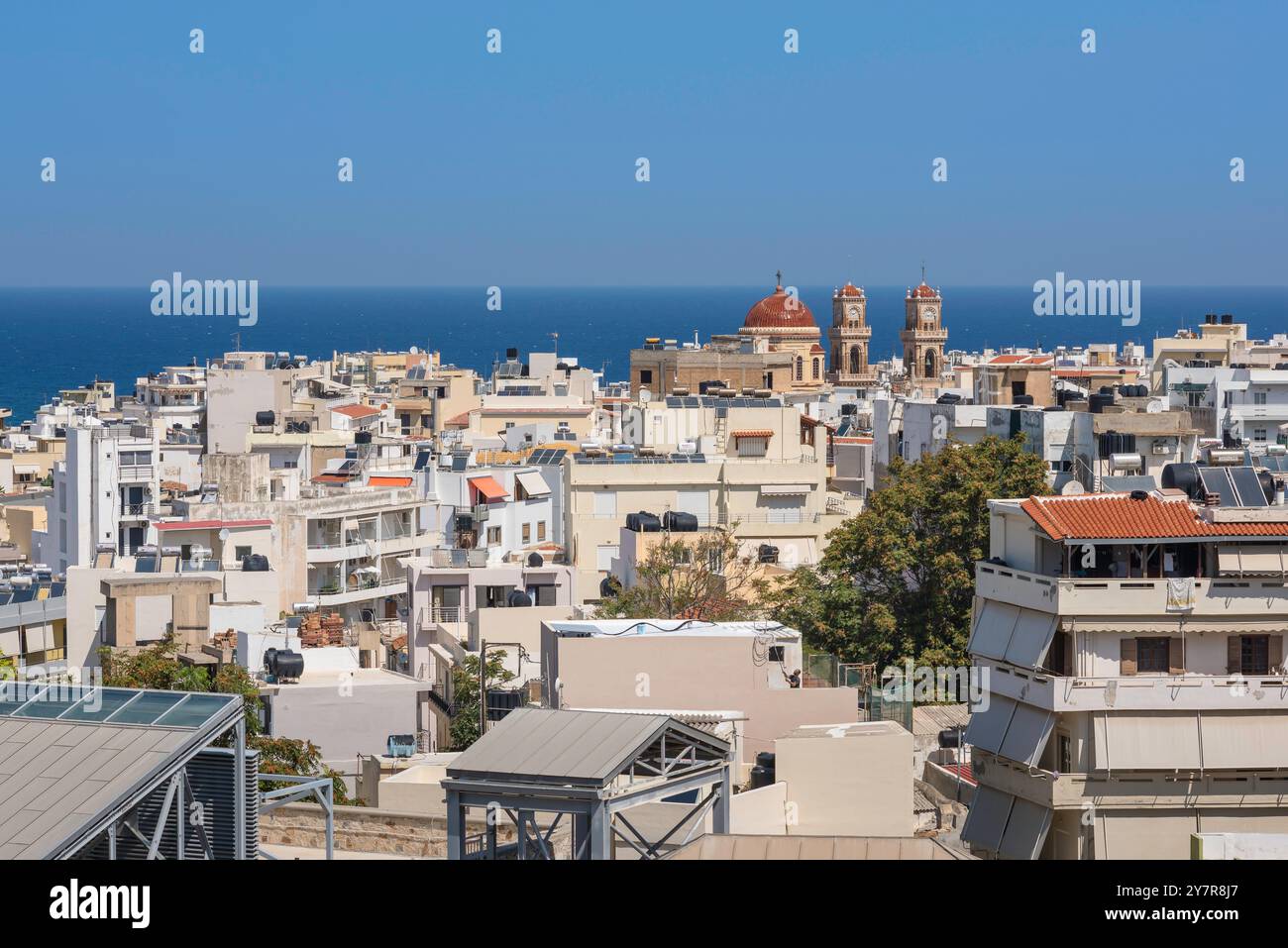 Heraklion skyline cityscape, view across the centre of Heraklion showing the dome and turrets of the city cathedral in the distance, Iraklio, Crete Stock Photo