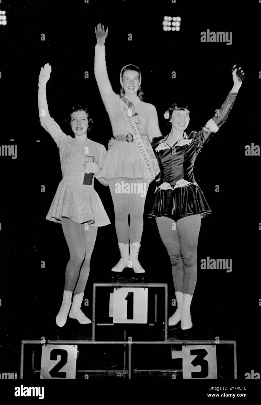 ERICA BATCHELOR GAINS THIRD PLACE AT FIGURE SKATING CHAMPIONSHIP 20.2.54. Britain's Erica Batchelor was beaten into a glorious third place by the new champion Gundi Busch of Germany, and Tenley Albright the American star, at the Women's World Amateur Figure Skating Championship at Oslo. Twenty other young ladies from eight other countries took part in the contest. I.N.P. Photo shows- The first three from left to right: Tenley Albright (U.S.A.) runner-up, Gundi Busch (Germany) winner, and Erica Batchelor (Britain) who took third place. 551/EM 74674. International News Photos. Stock Photo