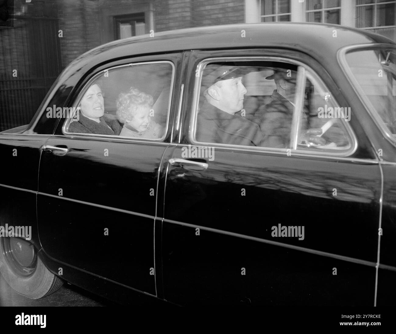 ROYAL CHILDREN OUT FOR A DRIVE 10.2.54. I.N.P. photo shows Princess Anne sitting cheerfully on the knee of her nurse, Nurse Lightbody, out for a drive this afternoon. They were accompanied by Prince Charles. Picture by Joe Waldorf. 74464/MB International News Photo. Stock Photo