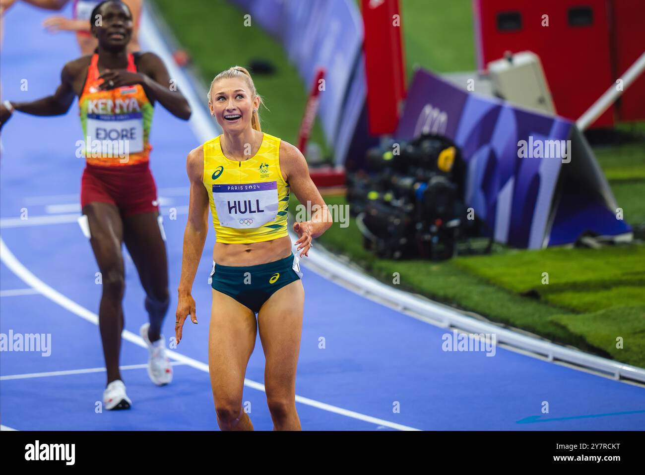 Jessica Hull celebrating her victory with her country's flag in the