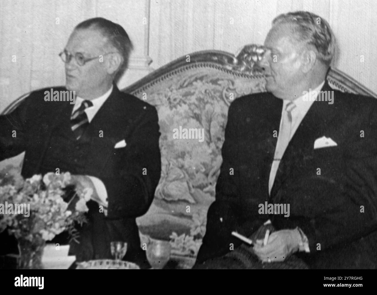 U.S. Ambassador meets Tito 19.11.53. INP photo shows the recently appointed U.S. Ambassador to Belgrade, James W. Riddleberger (left), at an informal meeting with President Tito, who is smoking a cigarette in his right-angled holder. 472/PJ/72677 International News Photos. Stock Photo