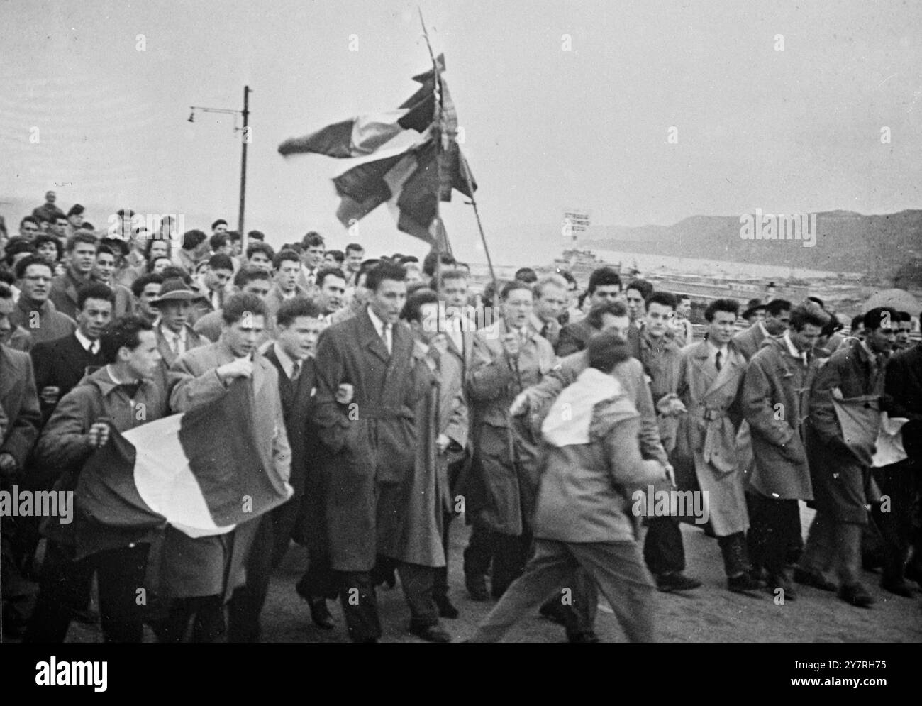 Celebrations & riots in Trieste 6.11.53: Three people, one a schoolboy, were killed and several injured during two days of rioting in the city of Trieste. Police opened fire to disperse angry mobs, and British and American troops moved into key positions. INP photo shows one of the demonstrations, in celebration of the 35th anniversary of the entry of Italian troops into the city on 3rd November, 1918. 3/PJ/72405 International News Photos. Stock Photo