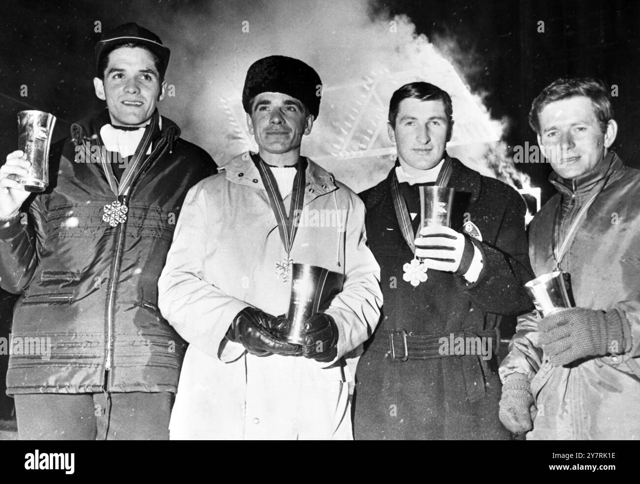 PRIZE WINNERSOslo, Norway : Pictured with their trophies at the award giving ceremonies of the World Nordic Skiing Championships at the Town Hall in Oslo, 21 February 1966 are, from left: Gjermund Eggen, of Norway, winner of the 15 km Cross Country; Eero Mantyranta, of Finland, winner of the 30km cross country; Bjorn Wirkola, of Norway, winner of the jumping event, and Georg Thoma, West Germany, who secured first place in Combined skiing. 24 February 1966 Stock Photo