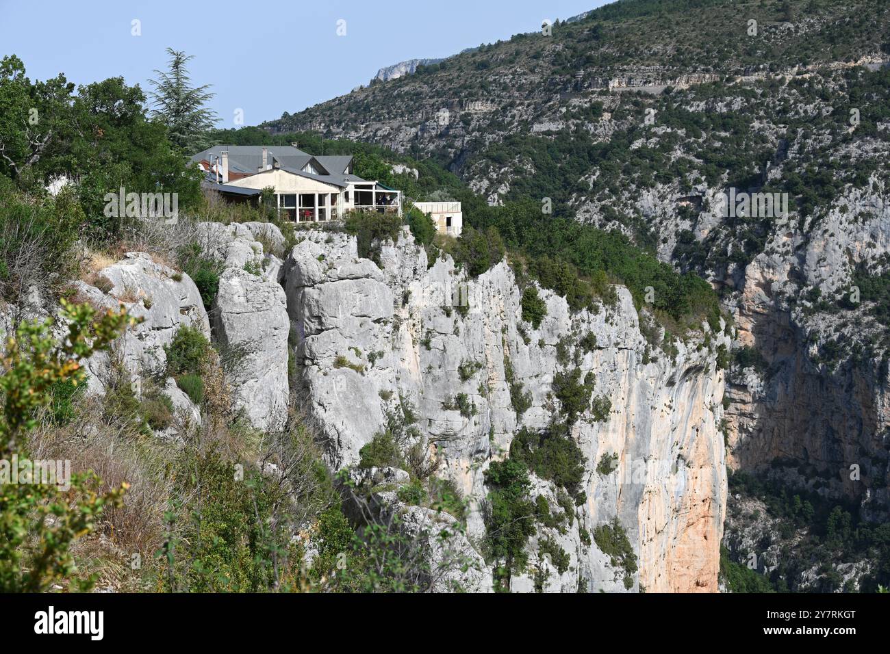 Logis, Restaurant and Hotel du Grand Canyon du Verdon Perched on the Falaise des Cavaliers on the Left Bank of Verdon Gorge or Gorges du Verdon Stock Photo